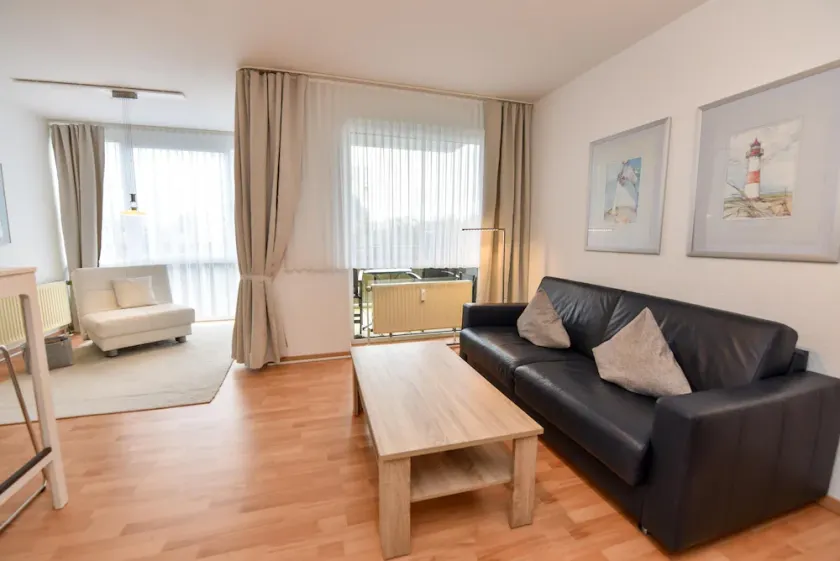Spacious 2-room apartment with balcony on the mezzanine floor of the PASSAT residence - Image 1