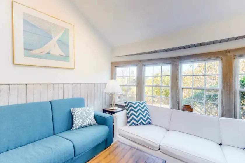 Rustic, sunny cottage w/ deck & W/D - walk to the beach & town! - Image 1
