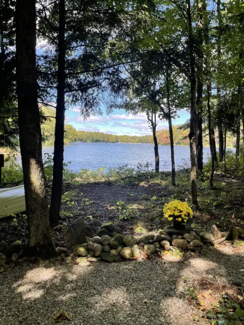Waterfront camper in Adirondack-like setting - Image 1
