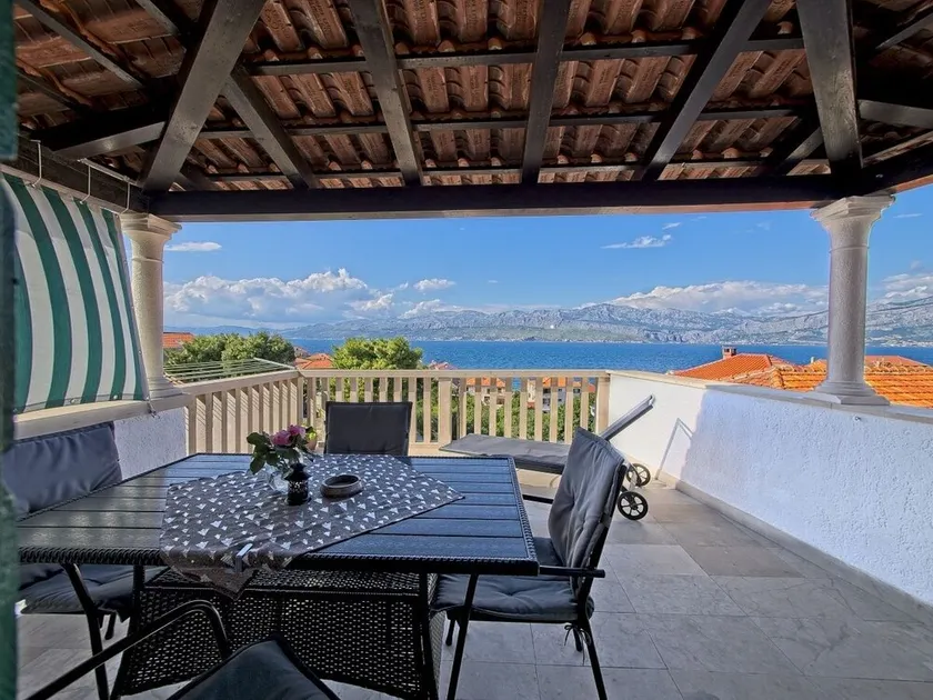 Two bedroom apartment with terrace and sea view Postira, Brač (A-11582-a) - Image 1