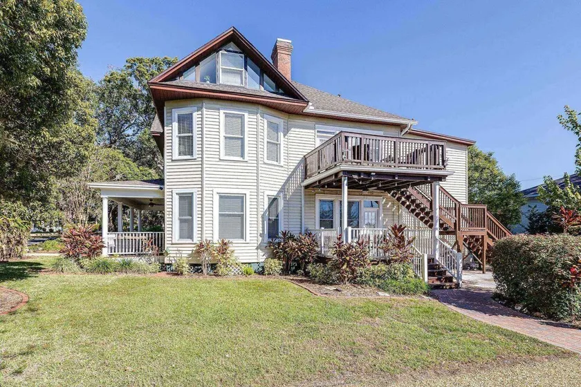 Historic Lakeland Retreat | 4 King Beds & Private Deck | Walk to Florida Southern - Image 1