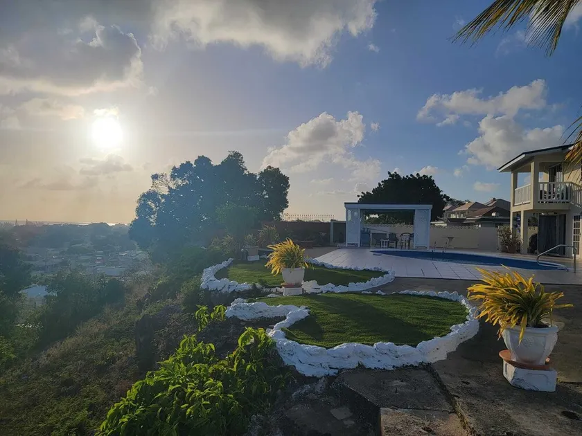 Hillside view and a pool - Image 1