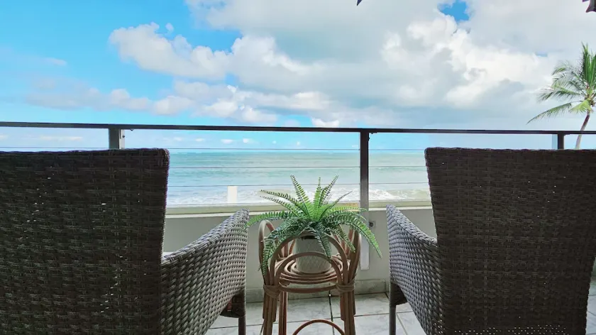 Guest Favorite • Beachfront Luquillo Condo • Walk to Kioskos & El Yunque - Image 1