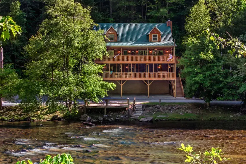 Log cabin with large decks on the Bank of the Tuckasegee River. - Image 1