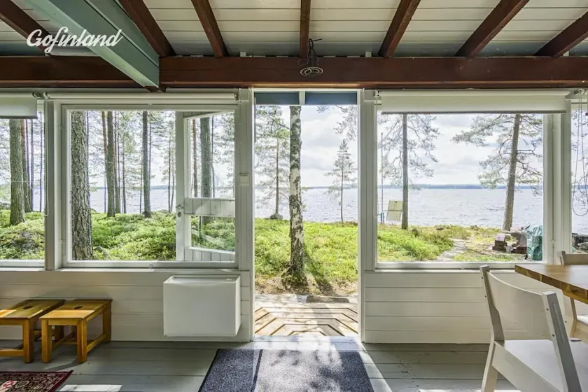 Casa de madera finlandesa en medio de la naturaleza en una isla privada - Image 1