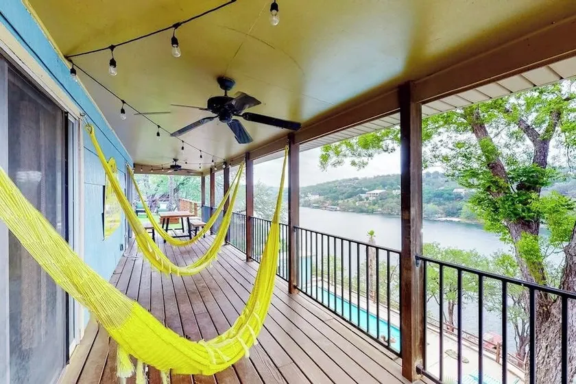 Mid-Century Modern Lake House with Private Waterfront Pool & Boat Dock - Image 1
