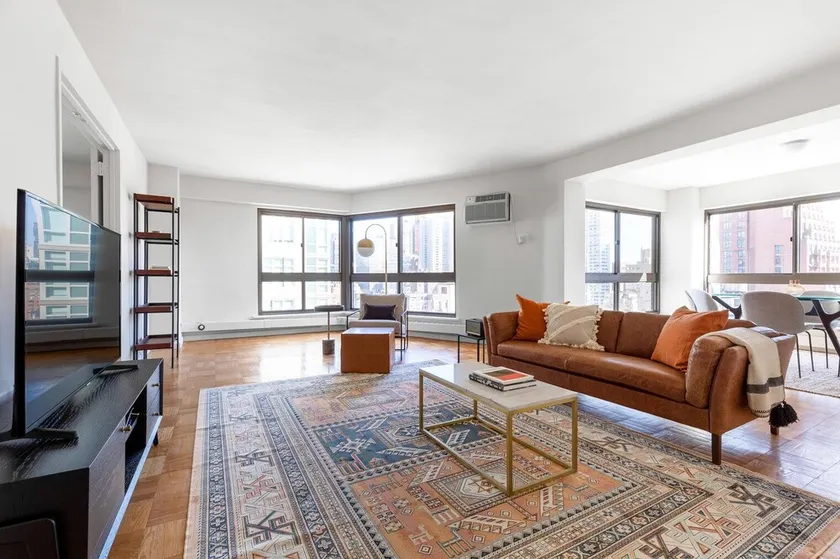 Airy Midtown East 2BR w/ Doorman, W/D, nr. Central Park, by Blueground - Image 1