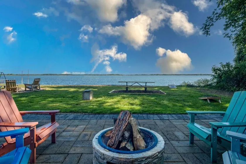 Waterfront 2BR Nautical Cottage on Grass Lake Hot Tub Firepit Year Round Fun - Image 1