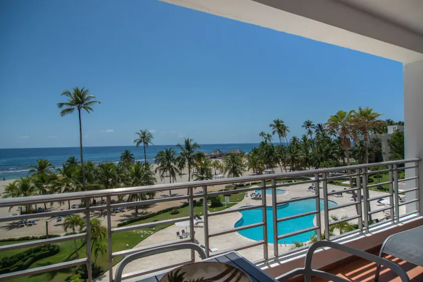 Trendy Beach Scene at a Harmony Beachfront Condo in Costa del Sol - Image 1