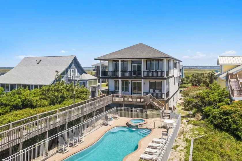 Discover Peace on the Beach, a stunning 6BR, 5BA oceanfront retreat in Oak Island. - Image 1