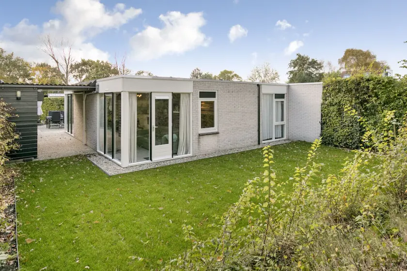 Cottage coast in South Holland behind the dunes by the sea - Image 1