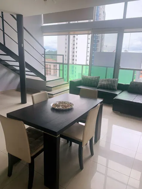 Modern loft-style, 2 level apartment  with city views, cover parking and pool. - Image 1
