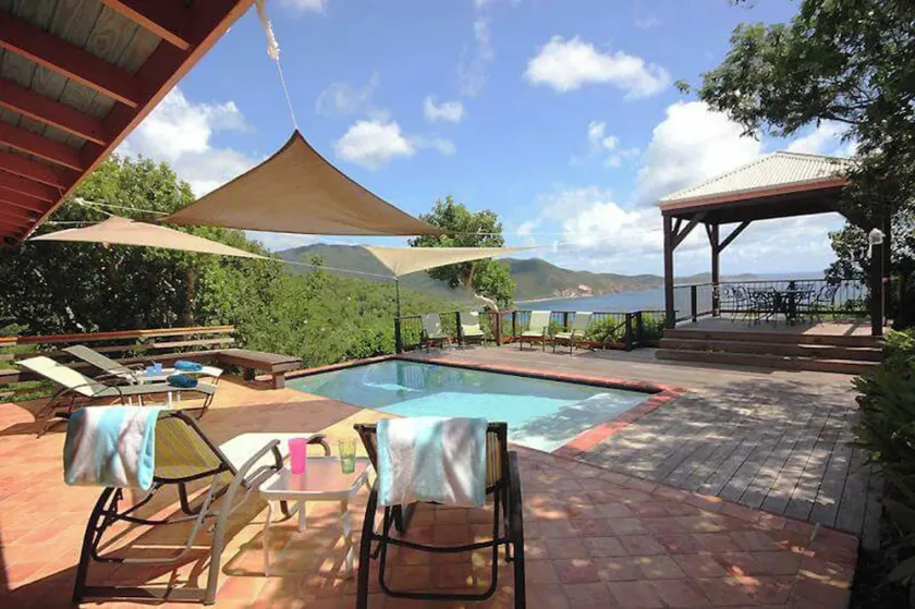 Escape to \"Over the Rainbow\" – your own private Caribbean cottage complete with a private pool, ocean view, and a/c. Experience tranquility in a stunning tropical paradise. Book your dream getaway today! - Image 1