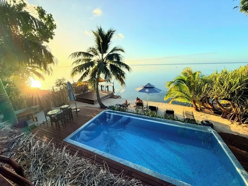Charming houses with private beach and seaside pool - Image 1
