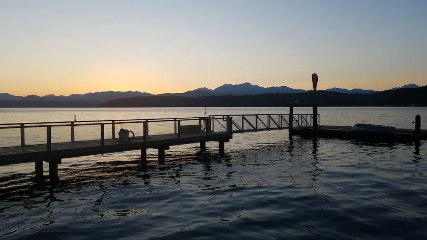 Waterfront home with dock, spacious deck & picturesque views - Image 1