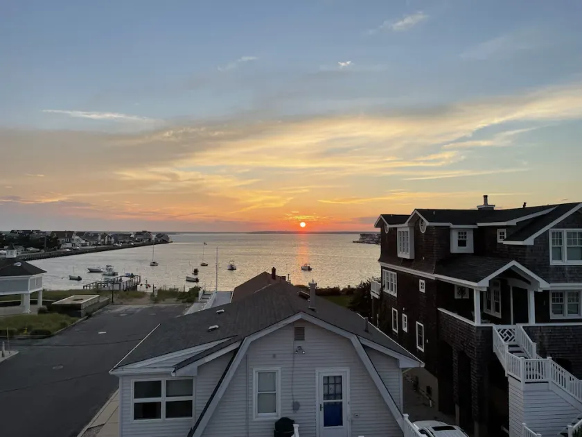 Views from roof top deck. Short walk to beach, bay, boardwalk, sleeps four.  - Image 1