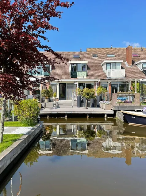 This property is a true prime location in the Green Heart with waterfront terrace - Image 1