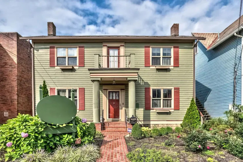 Kitchen, billiard and sun rooms. Walking distance to Main St. downtown. - Image 1