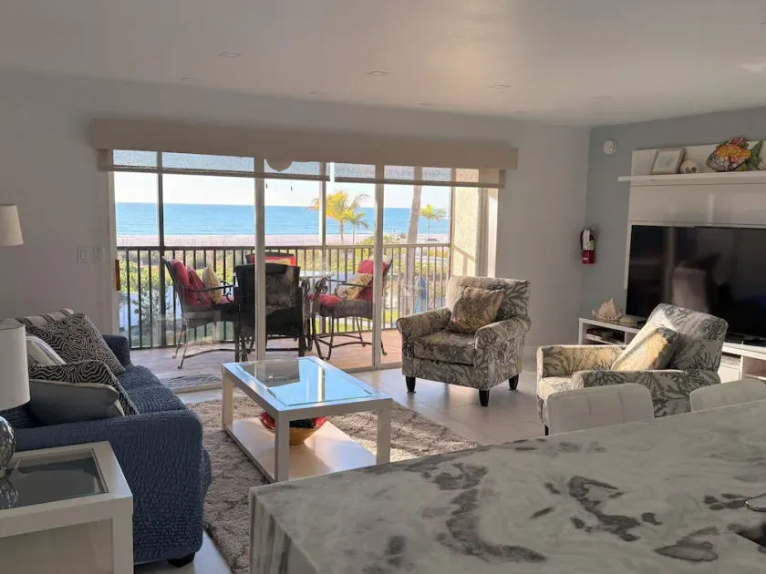 Gulf-front, heated pool, stocked kitchen, and private parking! - Image 1