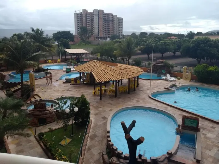 Suite in an apartment building with swimming pools and 24-hour reception in Caldas Novas. - Image 1