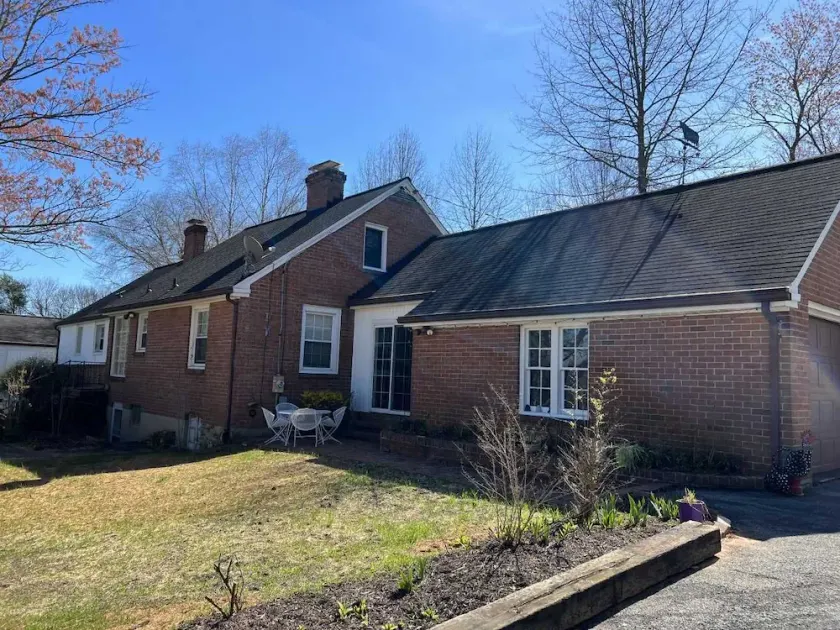 Charming brick ranch with an acre of beautiful garden - Image 1