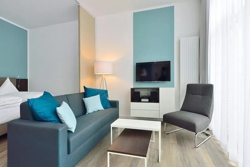Modern, dog-friendly apartment with west-facing terrace - only 20 m to the beach! - Image 1