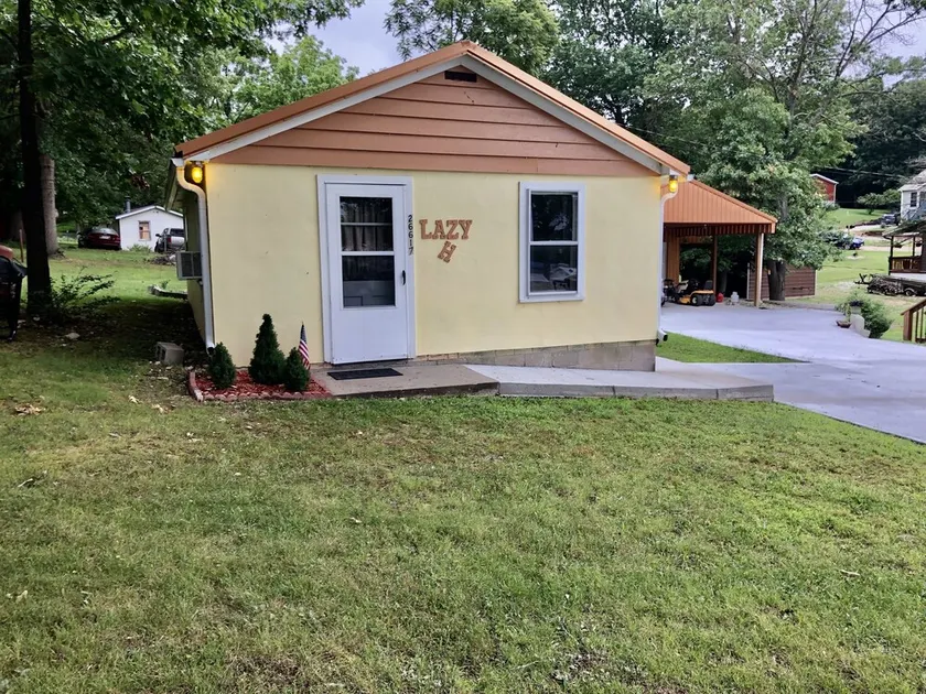 Lazy H Cabin Hyer Retreats LLC. Schlafen, Essen und Angeln!! am 81mkr Warsaw MO - Image 1
