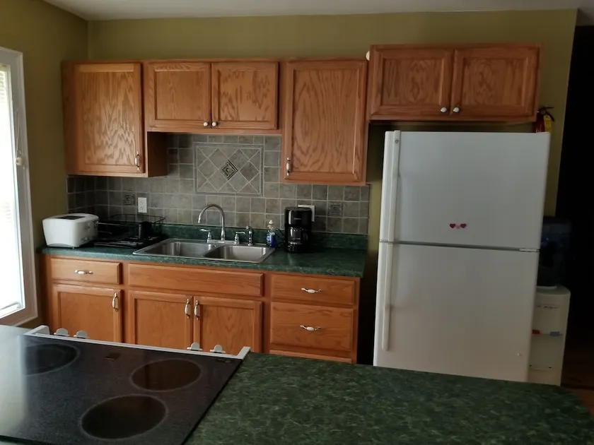 Nicely Renovated 2 BR 1 Bathroom house nestled among 160 acres of forested land - Image 1