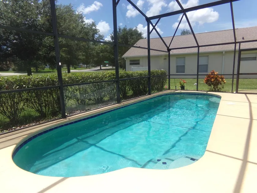 Come stay at our Orange Tree pool home, uniquely appealing - inside and out. Enjoy conveniently located shops, golf, dining and theme parks! - Image 1
