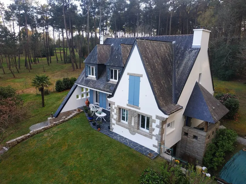 Neo-Breton house in a wooded area. - Image 1