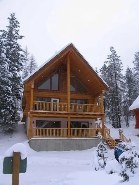 Cabane en rondins dans les bois - Image 1