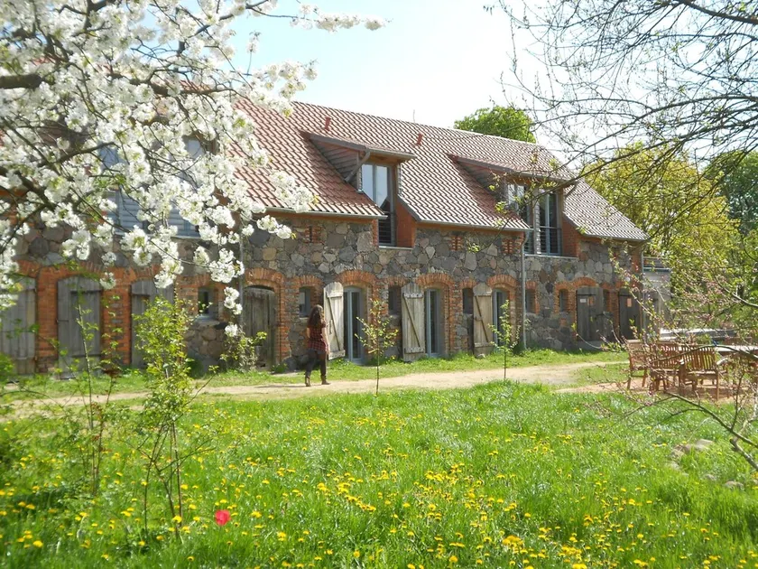Stylishly furnished fieldstone barn with dining room and terrace by the village pond - Image 1