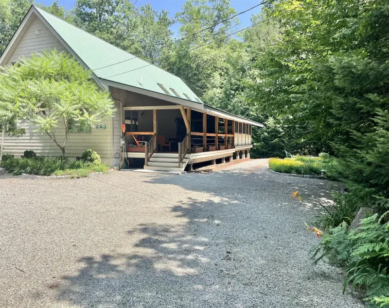 Located in desirable Knights Hill Association on Moose Pond in Bridgton - Image 1