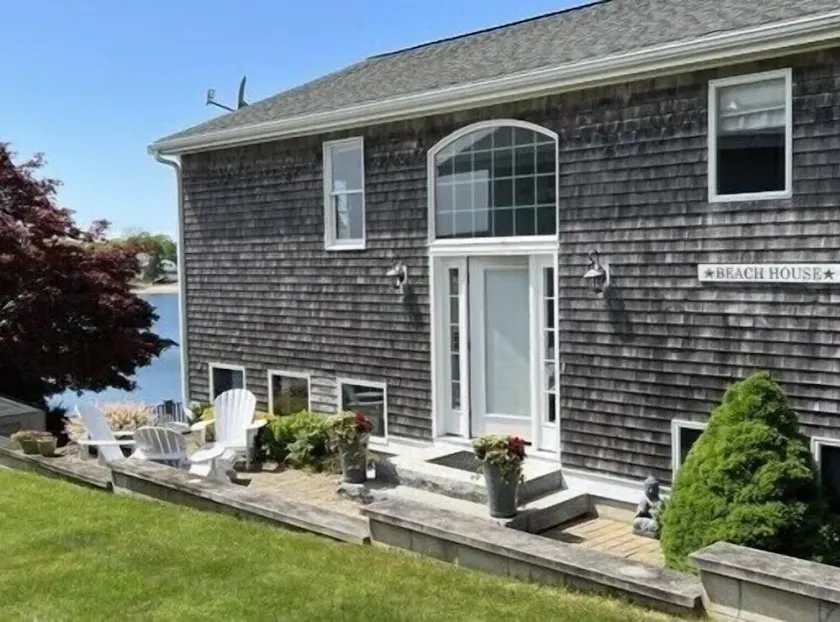 Waterfront Home with Spacious Deck and 4 Bedrooms - Image 1