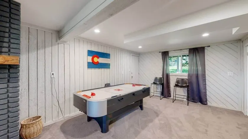 Cozy Four Bedroom Family Retreat with Yard and Air Hockey - Image 1