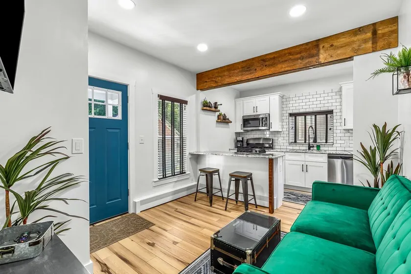 Walk to downtown Holly from this newly renovated historic apartment! - Image 1
