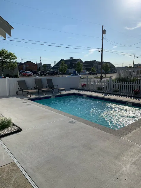 Ocean Breeze Retreat - 5 Bedroom / 2 Bath, HEATED POOL, Steps from downtown - Image 1