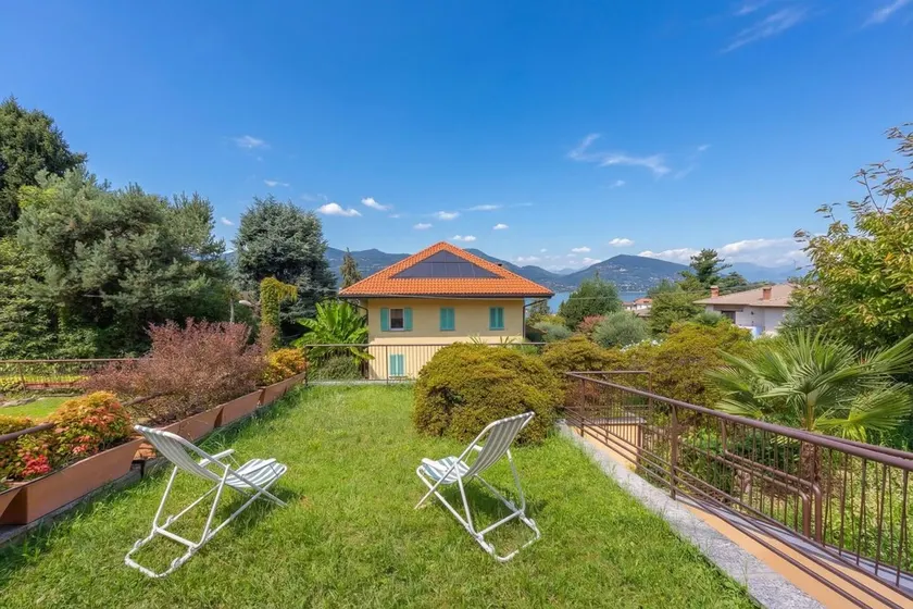 Sunset in Ranco: Lakeview Townhouse with Private Garden - Happy Rentals - Image 1