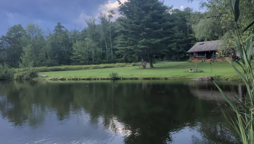 Rustic cabin on private pond and 7 acres! Woodstove, porch for wildlife viewing - Image 1