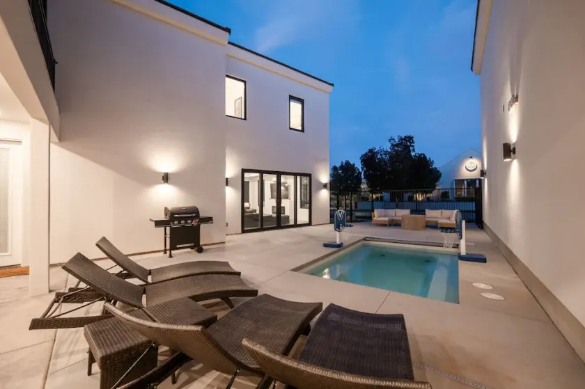 Two homes in one! Beautiful Courtyard with Pool! - Image 1