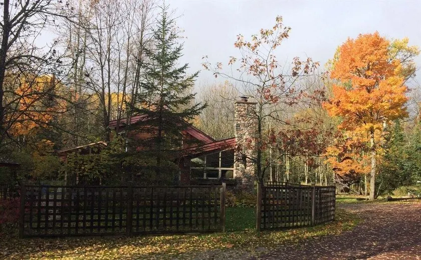 Custom Built Home Neslted in the Woods - Image 1