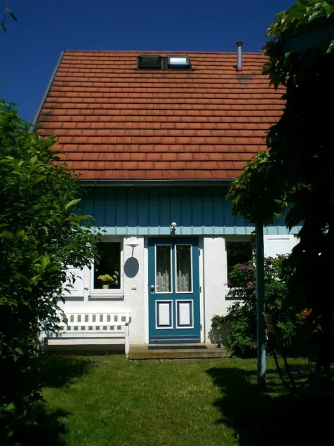 Cosy and sunny row house - Image 1