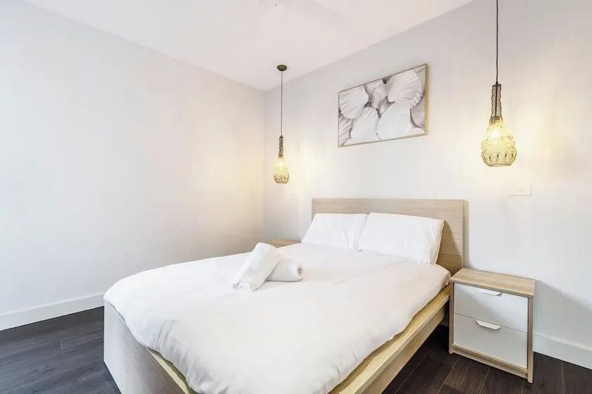 Stroll to the beach + Indoor Parking! - Image 1