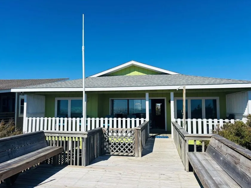 Enjoy oceanfront bliss at When Pigs Fly, a spacious 4BR gem in Holden Beach, NC. - Image 1
