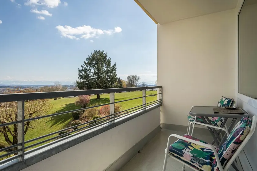 Apartment “Panoramablick” with Lake and Mountain View, Garden & Pool - Image 1