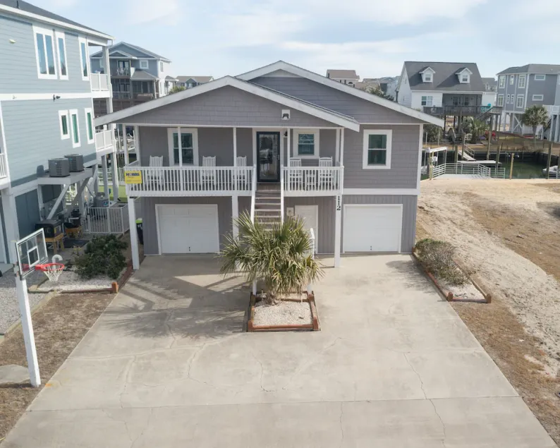 Hobbs Realty - You will be \"Tank Fully at the Beach\" in this charming cottage located on the canal - Image 1