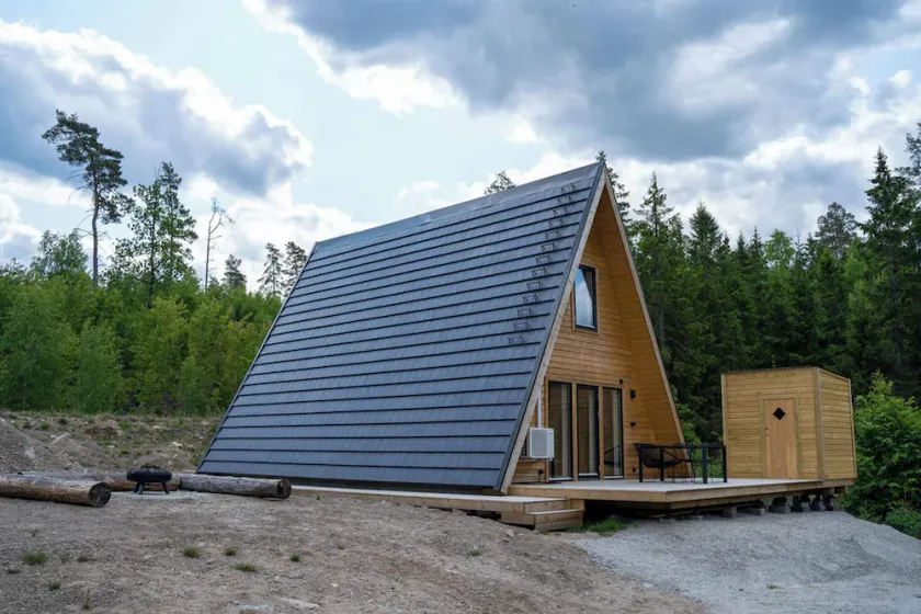 A Frame Cottage Surrounded by a Forest - Image 1