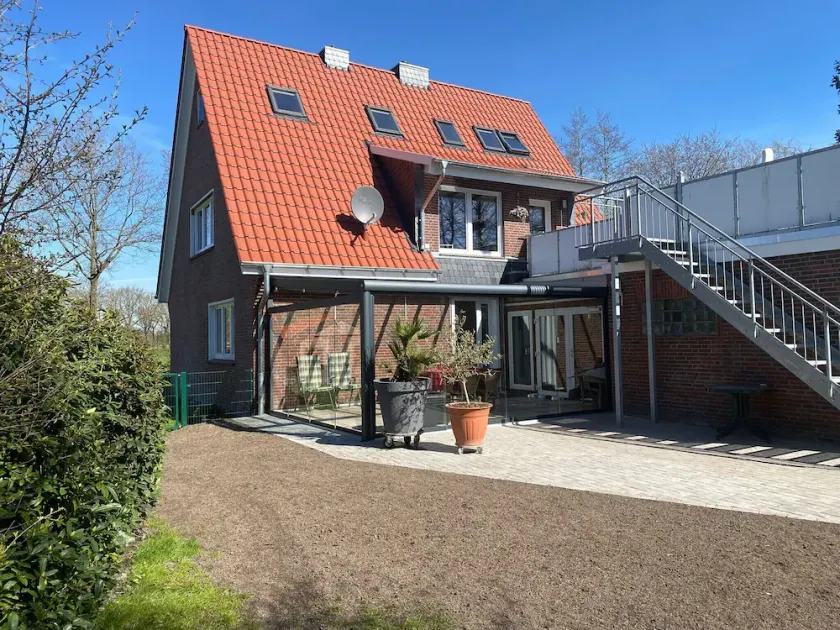 Dog-friendly vacation apartment in East Frisia with fenced garden - Image 1