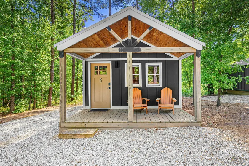 Cabin #8: Studio style layout with kitchenette and a large gravel parking pad beside the cabin for easy boat or trailer storage. - Image 1
