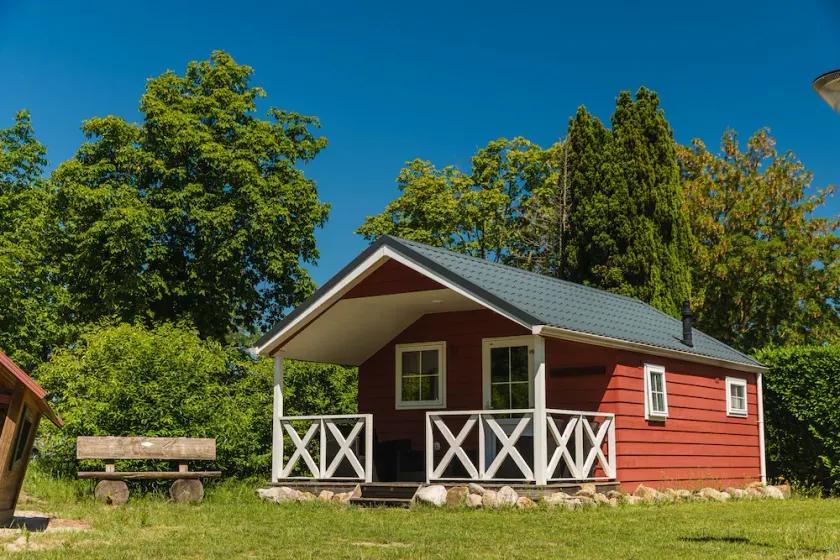 Luxury glamping is done in this colorful Scandinavian lodge. - Image 1